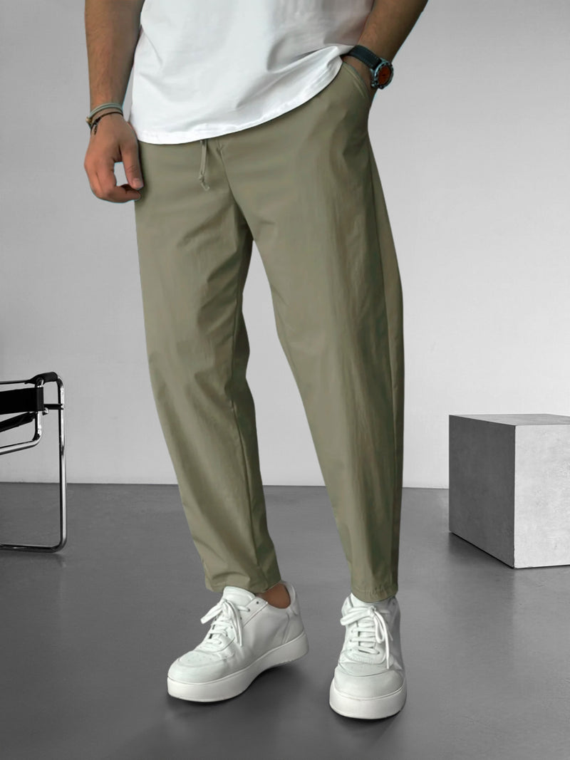 Elegantes pantalones ajustados con cordón