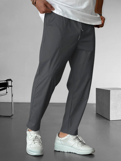 Elegantes pantalones ajustados con cordón